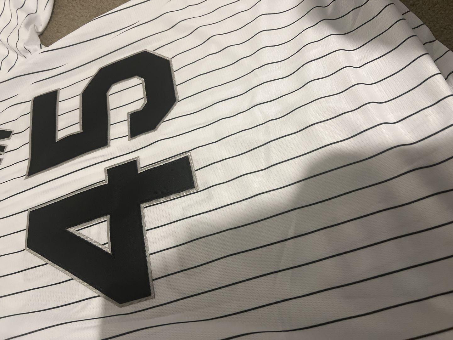 Customer photo review of White-Black Pinstripe Custom Baseball Jersey