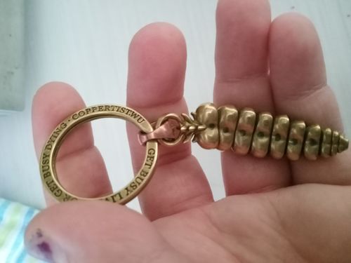 Customer photo review of Brass Rattlesnake Tail Pendant