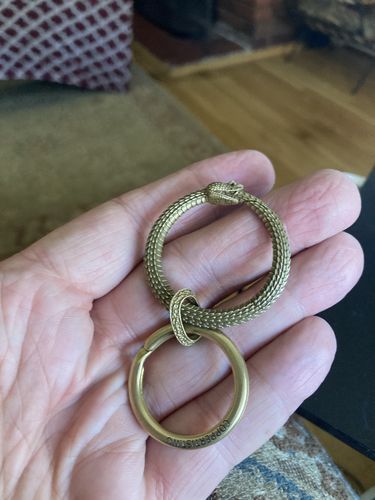 Customer photo review of Brass Ouroboros Snap Keychain