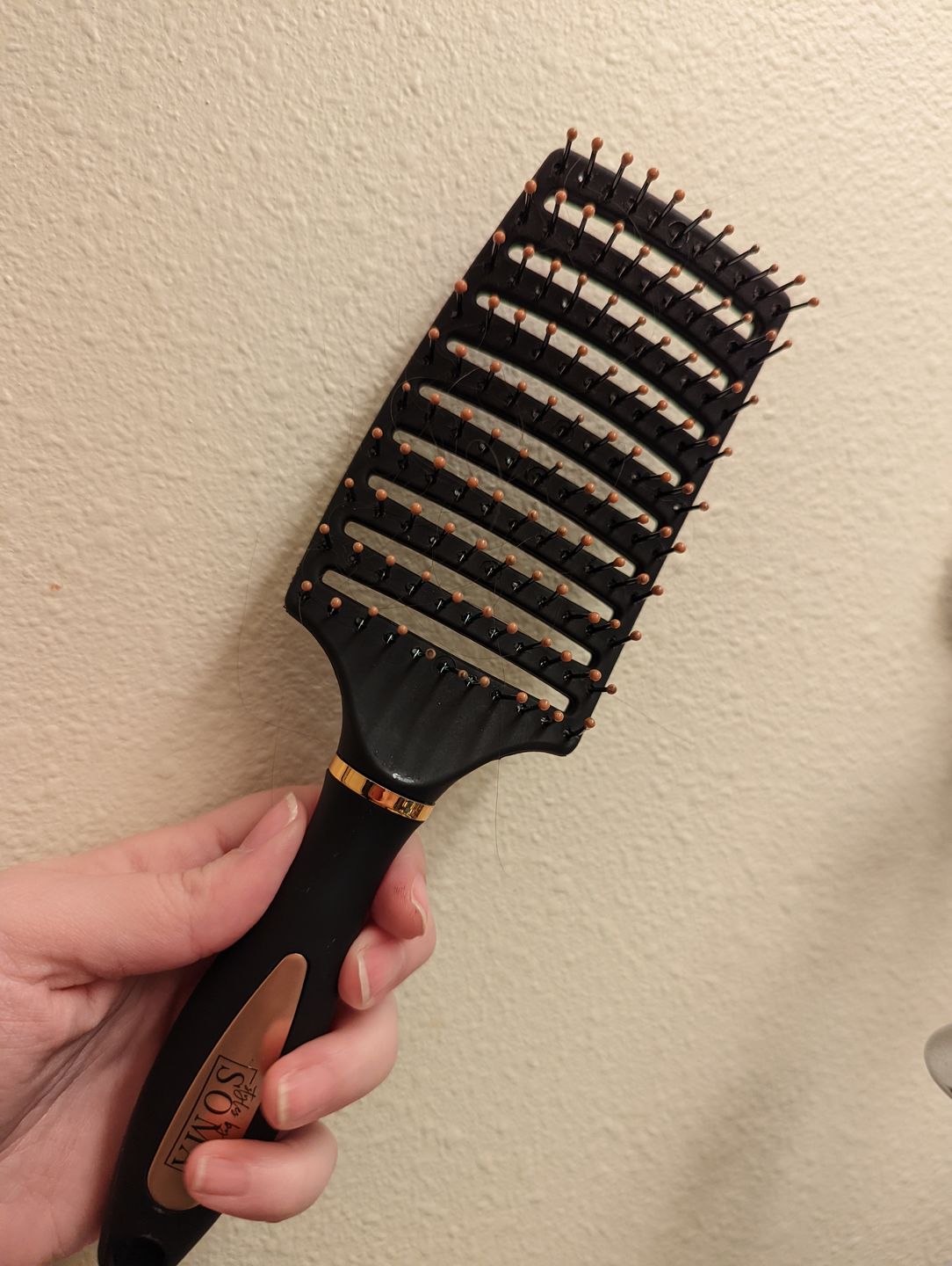 Customer photo review of Deluxe Detangle Brush