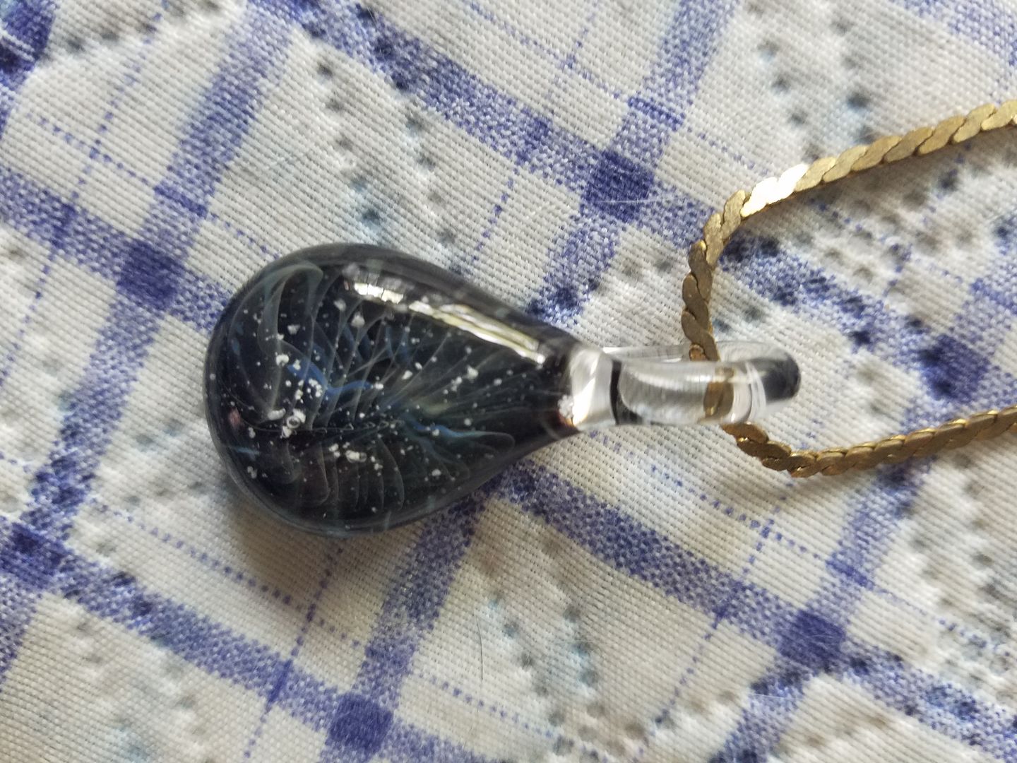Customer photo review of Ghost Pendant with Infused Cremation Ashes