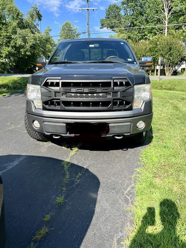 Customer photo review of Armor Grille w/Off-Road Lights, Replaceable Letters- Matte Black for 2009-2014 Ford F150