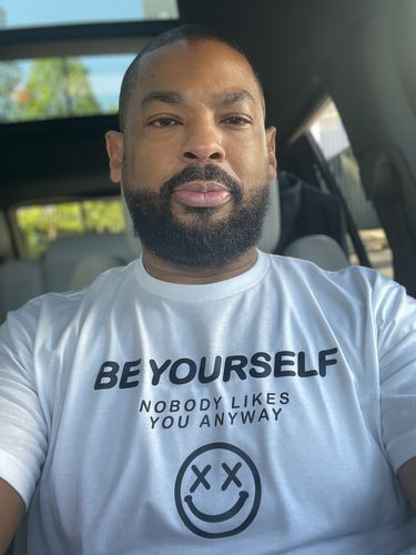Customer photo review of Salty Savage Unisex “BE YOURSELF, NOBODY LIKES YOU ANYWAY” Tee | White
