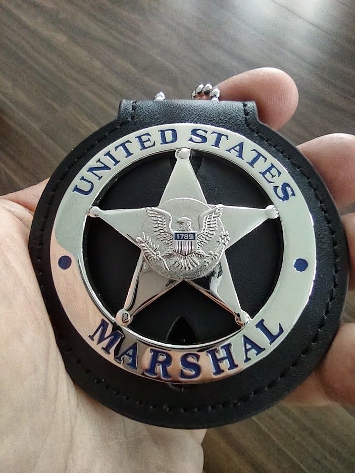 Customer photo review of US Federal Court Law Enforcement MARSHAL Badge Solid Copper Replica Movie Props
