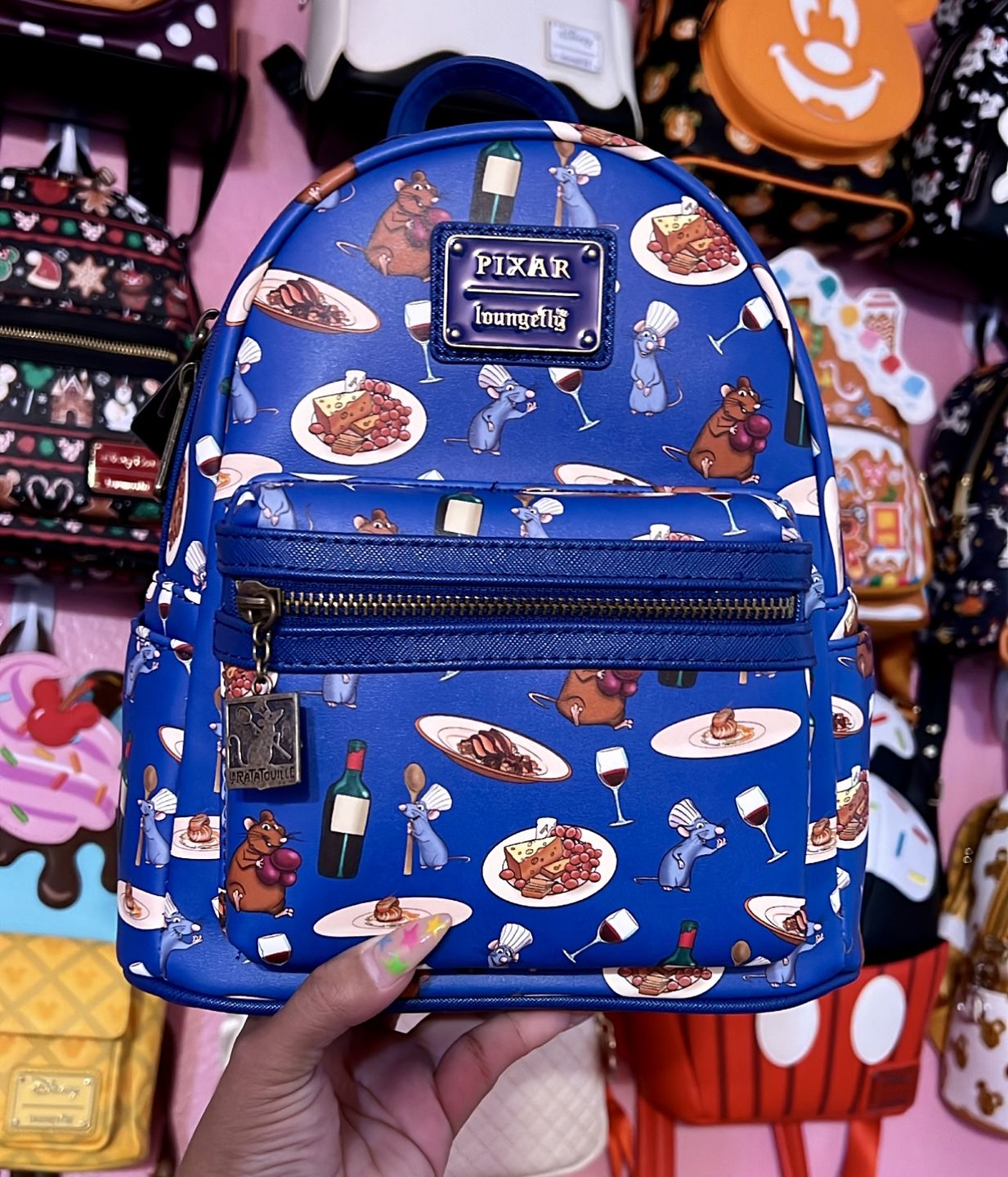 Customer photo review of 707 Street Exclusive -  Loungefly Disney Pixar Ratatouille Remy and Emile Allover Print Mini Backpack