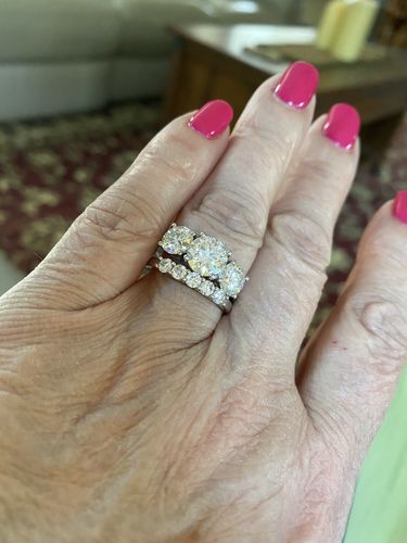 Customer photo review of Classic Three Stone Round Cut Moissanite Sterling Silver Wedding Ring