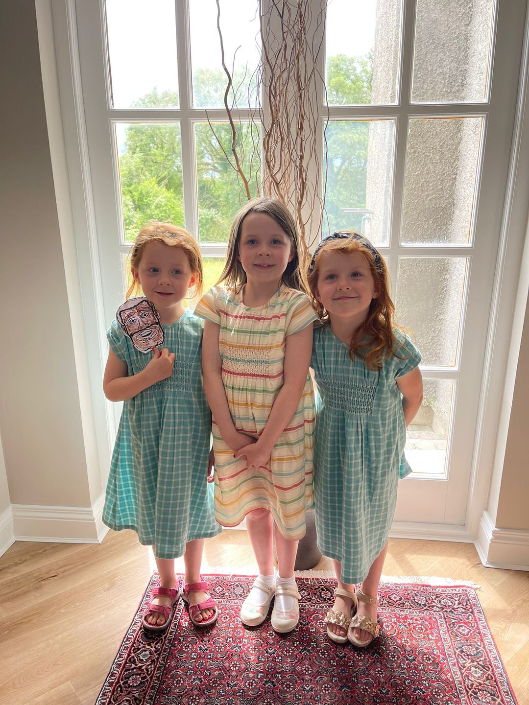 Customer photo review of Rainbow Striped Smocked Floaty Dress