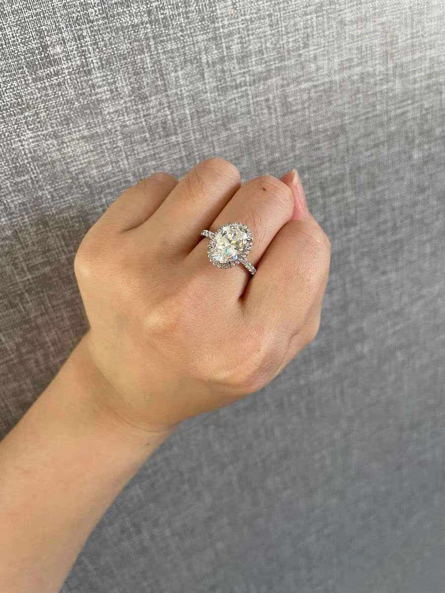 Customer photo review of Louily Halo 3.5Ct Oval Cut Simulated Diamond Engagement Ring In Sterling Silver