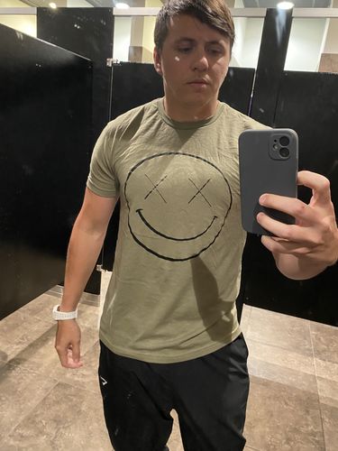 Customer photo review of Salty Savage Unisex OG Smile Tee | In Your Face Edition | Olive Green/Black