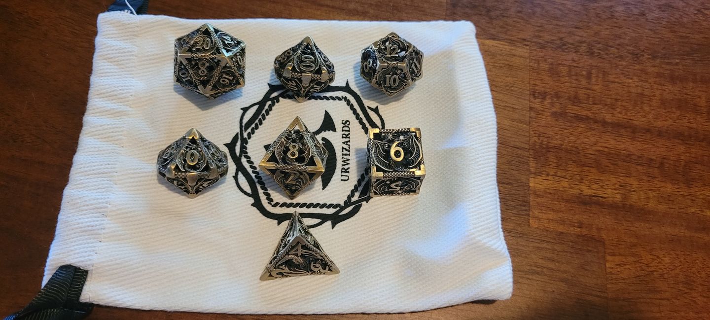 Customer photo review of URWizards D&D Hollowed Metal Dice Set Dragon