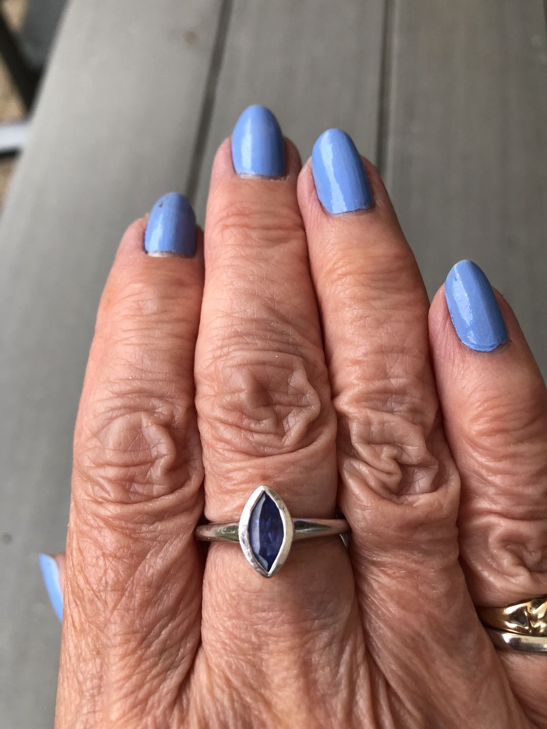 Customer photo review of Surf Moon Ring with Tanzanite