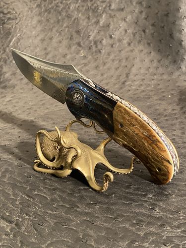 Customer photo review of Brass Octopus Phone Holder