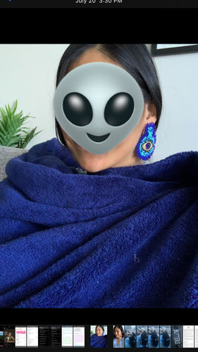 Customer photo review of Smokey Eye Evil Eye Earrings