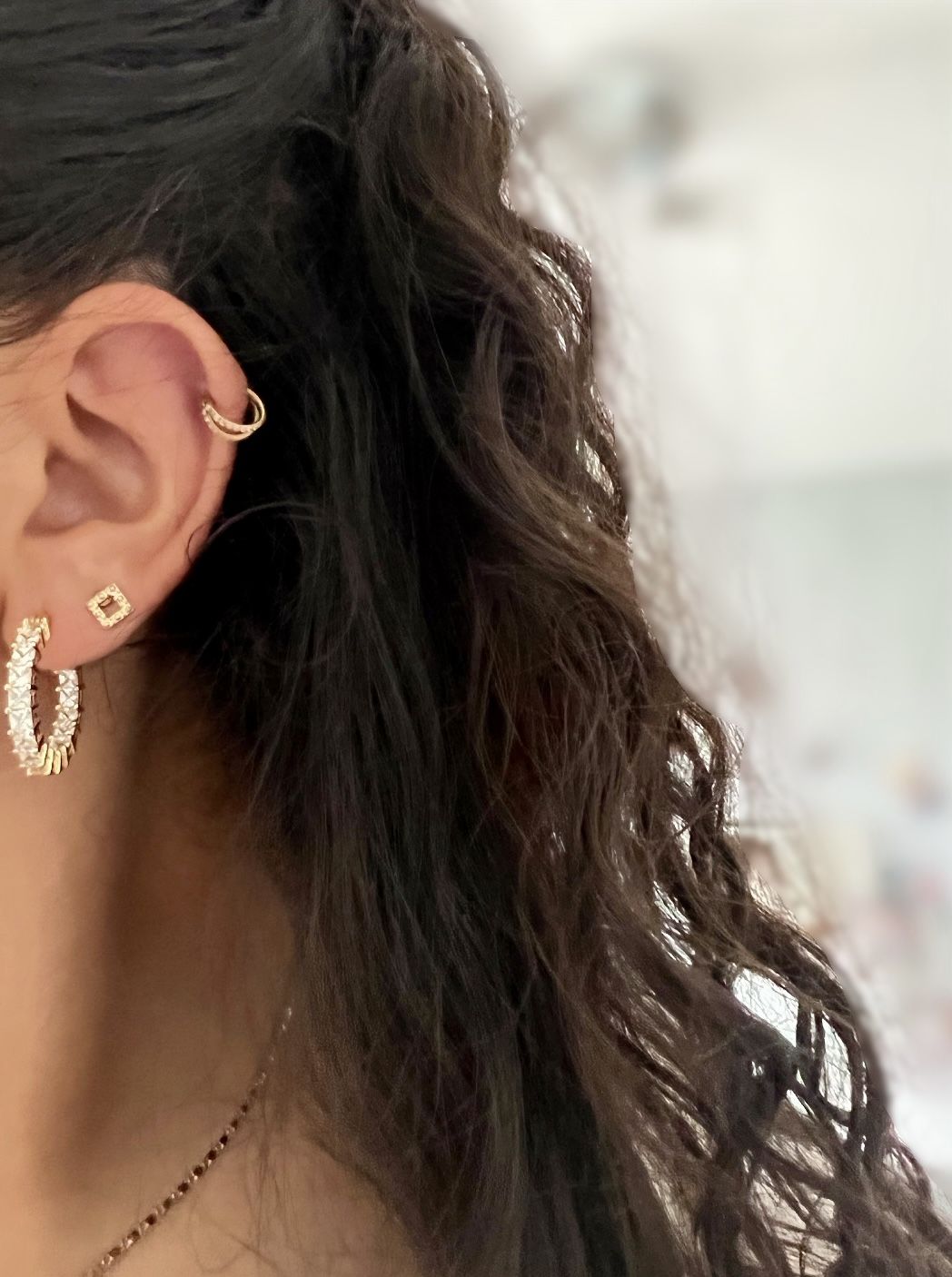 Customer photo review of Double Clicker Piercing | Titan