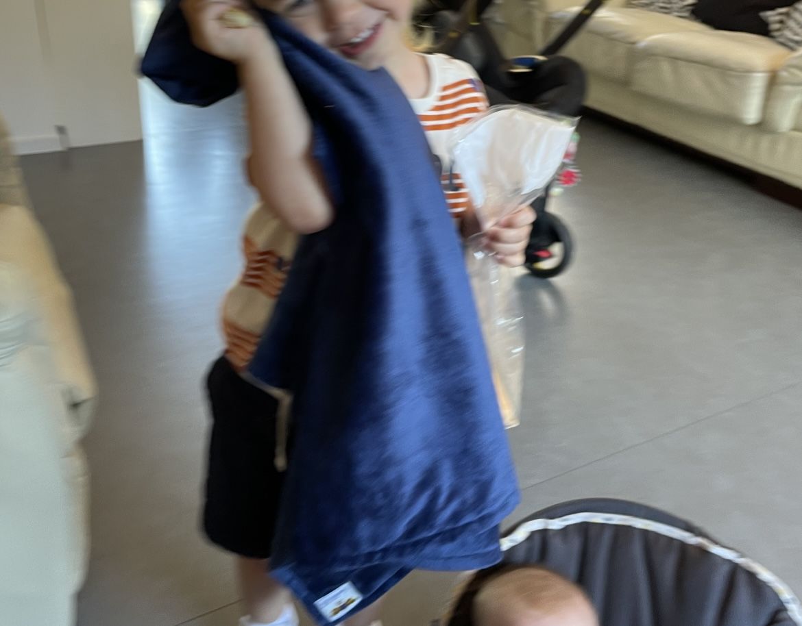 Customer photo review of MinkyBee Stroller Blanket Solid Navy