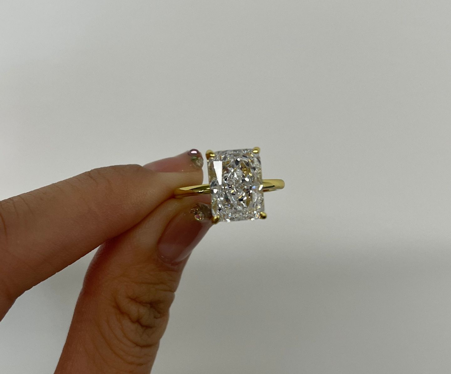Customer photo review of S925 Classic 4.5 Carat Radiant Cut Simulated Diamond Engagement Ring/Wedding Set