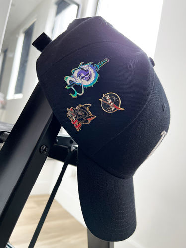 Customer photo review of Anodized Dragon Pin