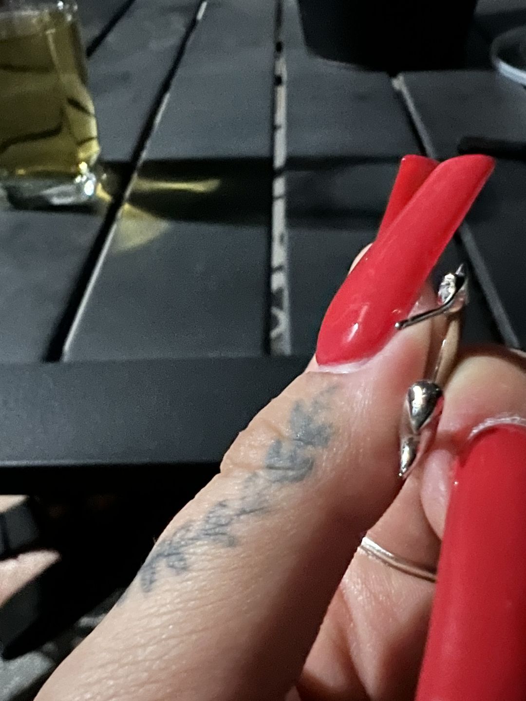 Customer photo review of SPIKED OPEN HOOP EARRING