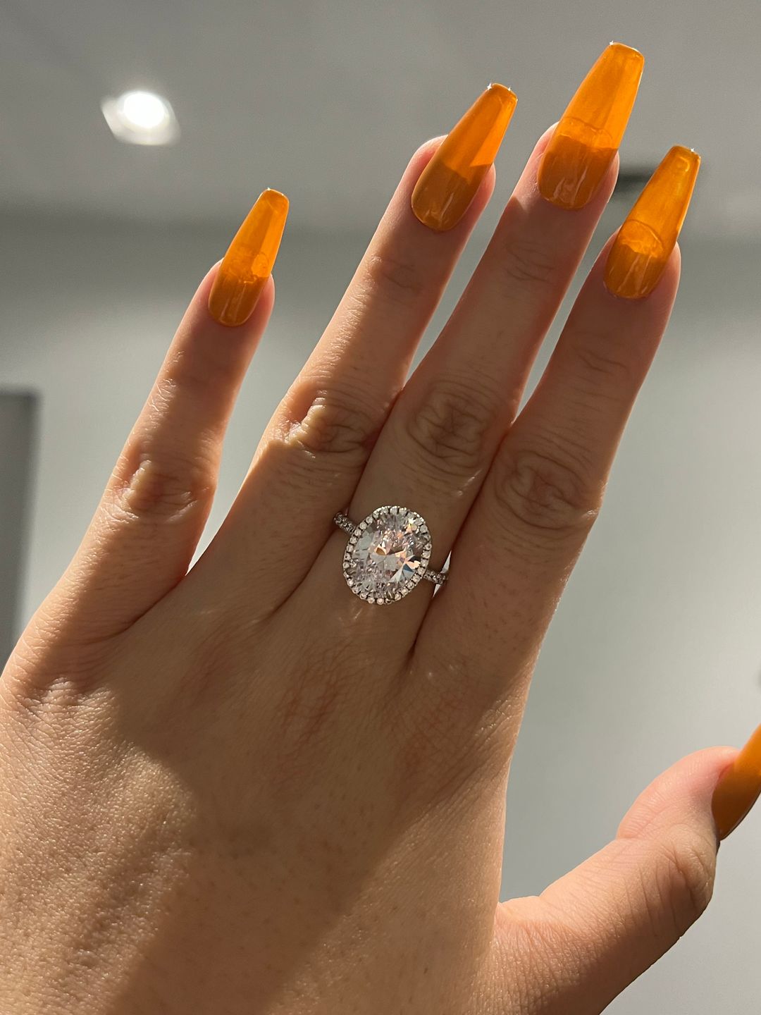 Customer photo review of Louily Halo 3.5Ct Oval Cut Simulated Diamond Engagement Ring In Sterling Silver