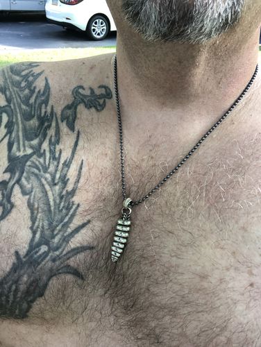 Customer photo review of Brass Rattlesnake Tail Pendant