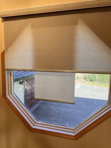 Customer photo review of SmartWings Motorized Light Filtering Roller Shades 70% Blackout Safari