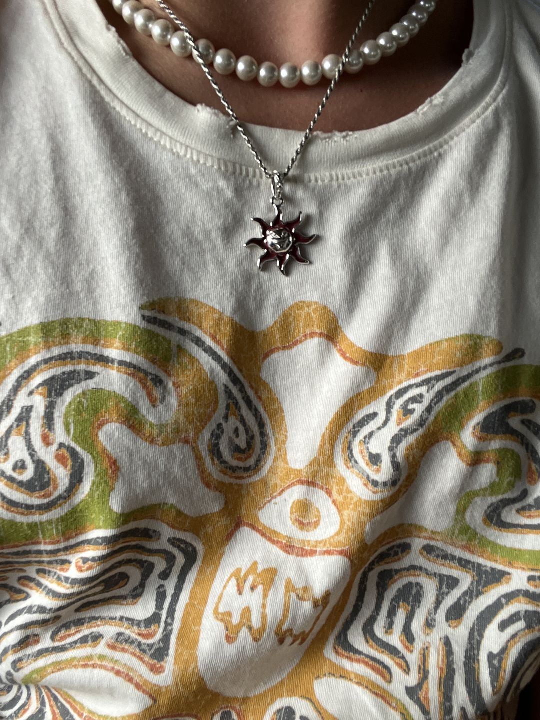 Customer photo review of SUNNY THE SOMBER SUN PENDANT
