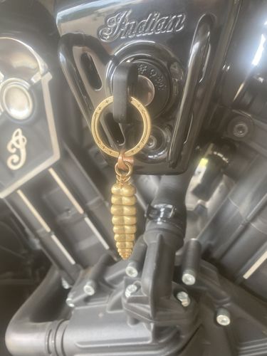 Customer photo review of Brass Rattlesnake Tail Pendant