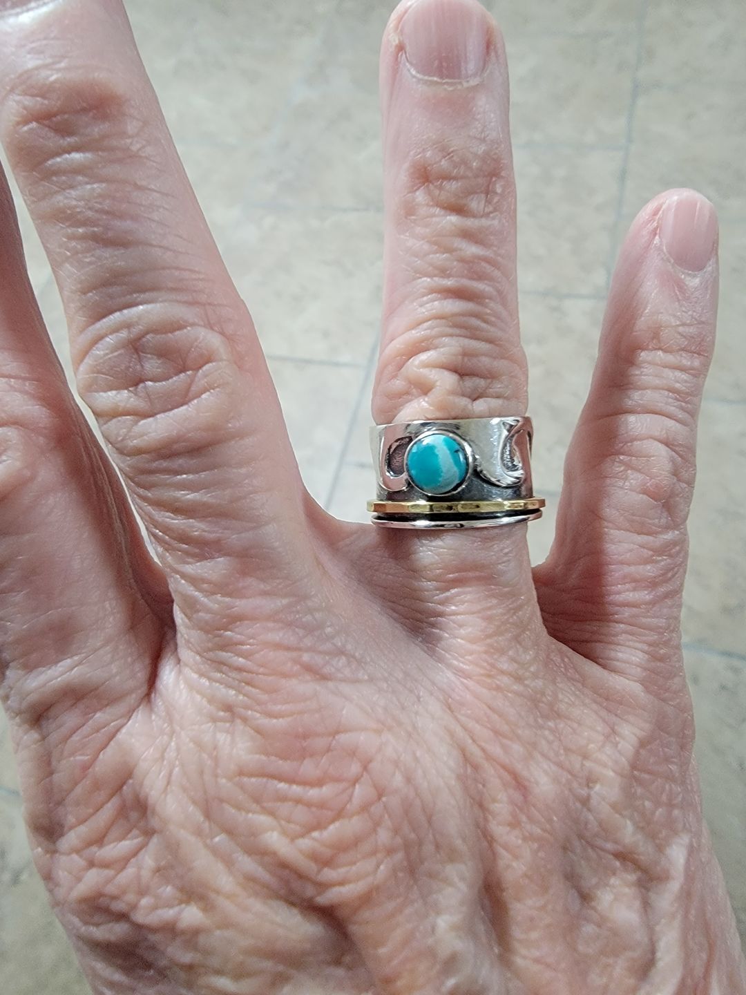 Customer photo review of Aquamarine Leaf Spinner ring Sterling Silver