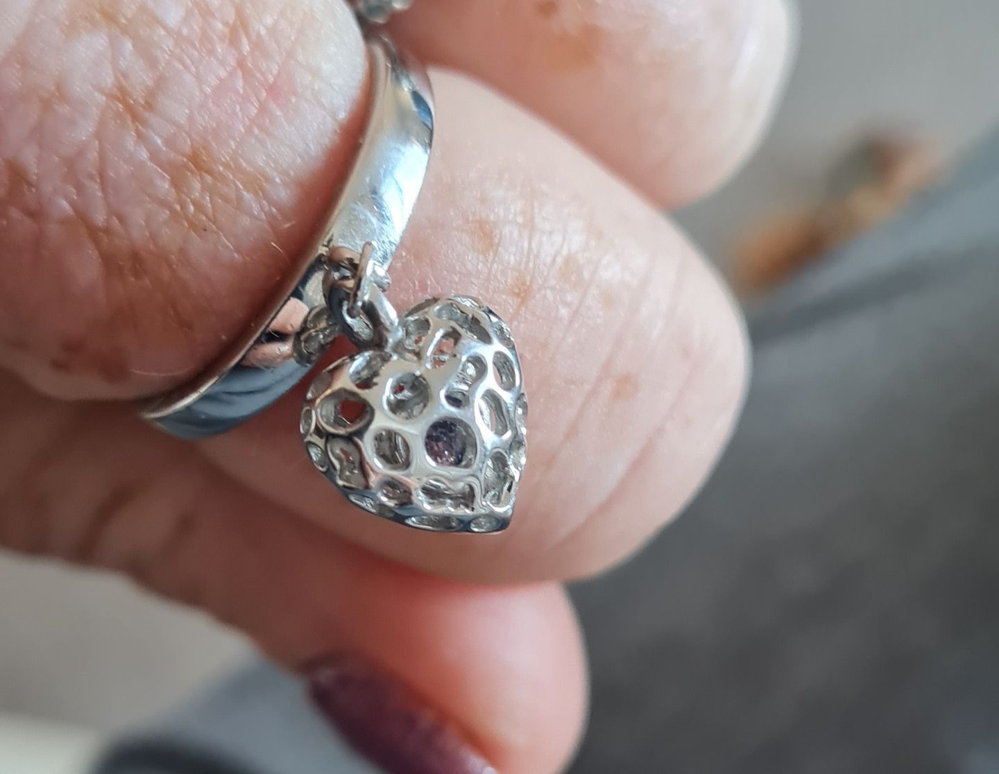 Customer photo review of Angel Heart Charm Ring with Tanzanite