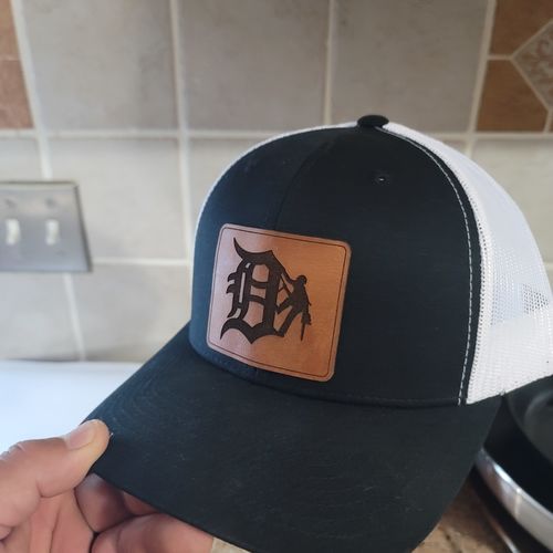 Customer photo review of Custom Leather Patch Trucker Hat - Yupoong 6606