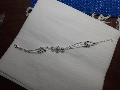 Customer photo review of Pulsera Triple Babel