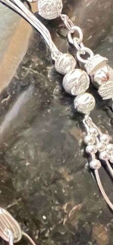 Customer photo review of Pulsera Triple Babel