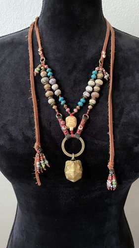 Customer photo review of Brass Tortoise Bell Pendant