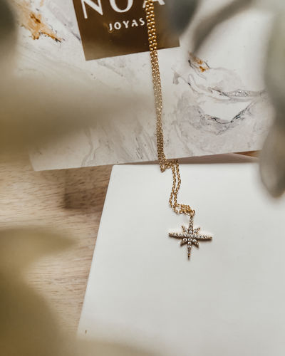 Customer photo review of COLLAR ESTRELLA MADI BAÑO DE ORO