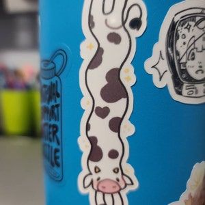 Customer photo review of MORE Sparkly Long Cow Stickers!