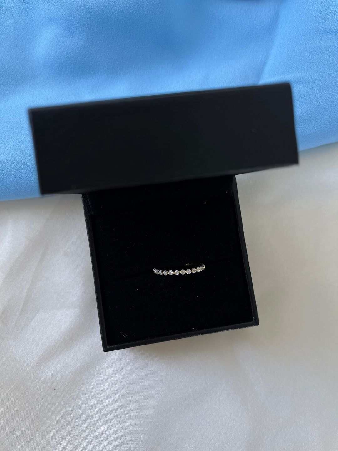 Customer photo review of Louily Classic Round Cut Full Eternity Wedding Band In Sterling Silver
