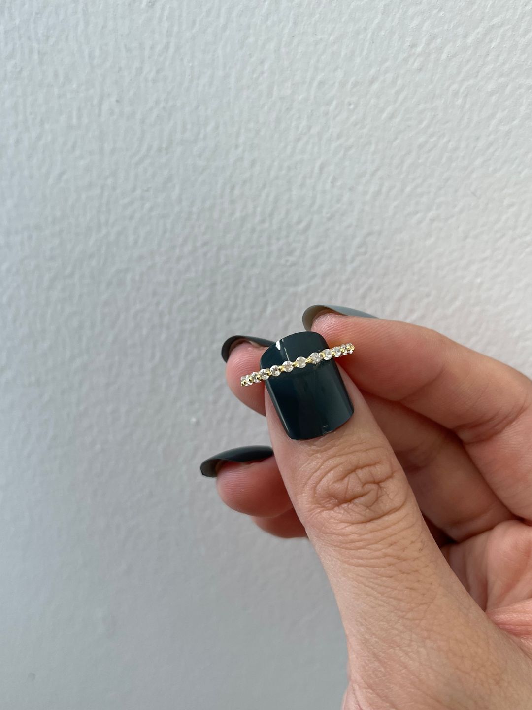 Customer photo review of Louily Classic Round Cut Full Eternity Wedding Band In Sterling Silver