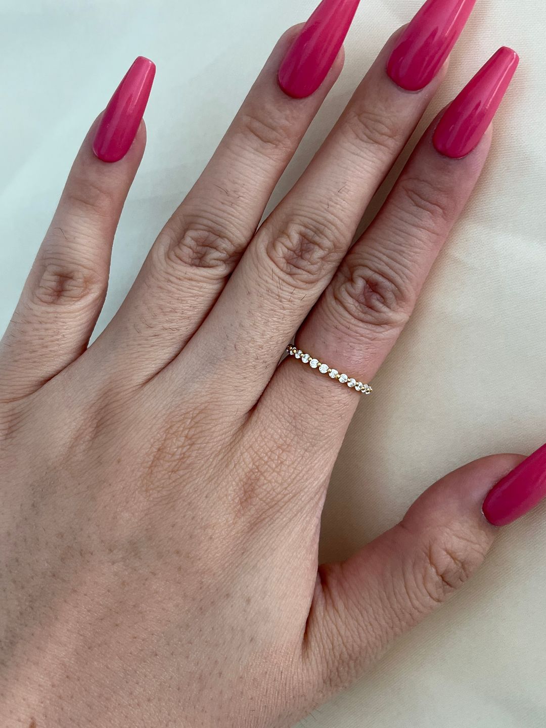Customer photo review of Louily Classic Round Cut Full Eternity Wedding Band In Sterling Silver