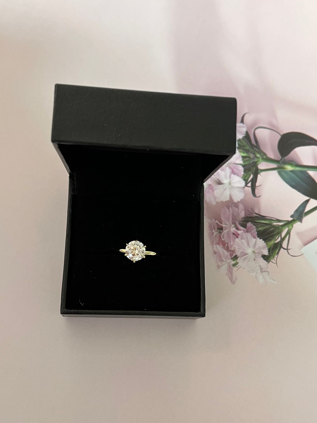 Customer photo review of S925 Moissanite/ Simulated Diamond 2.0 Carat Round Cut Solitaire Engagement Ring In Sterling Silver