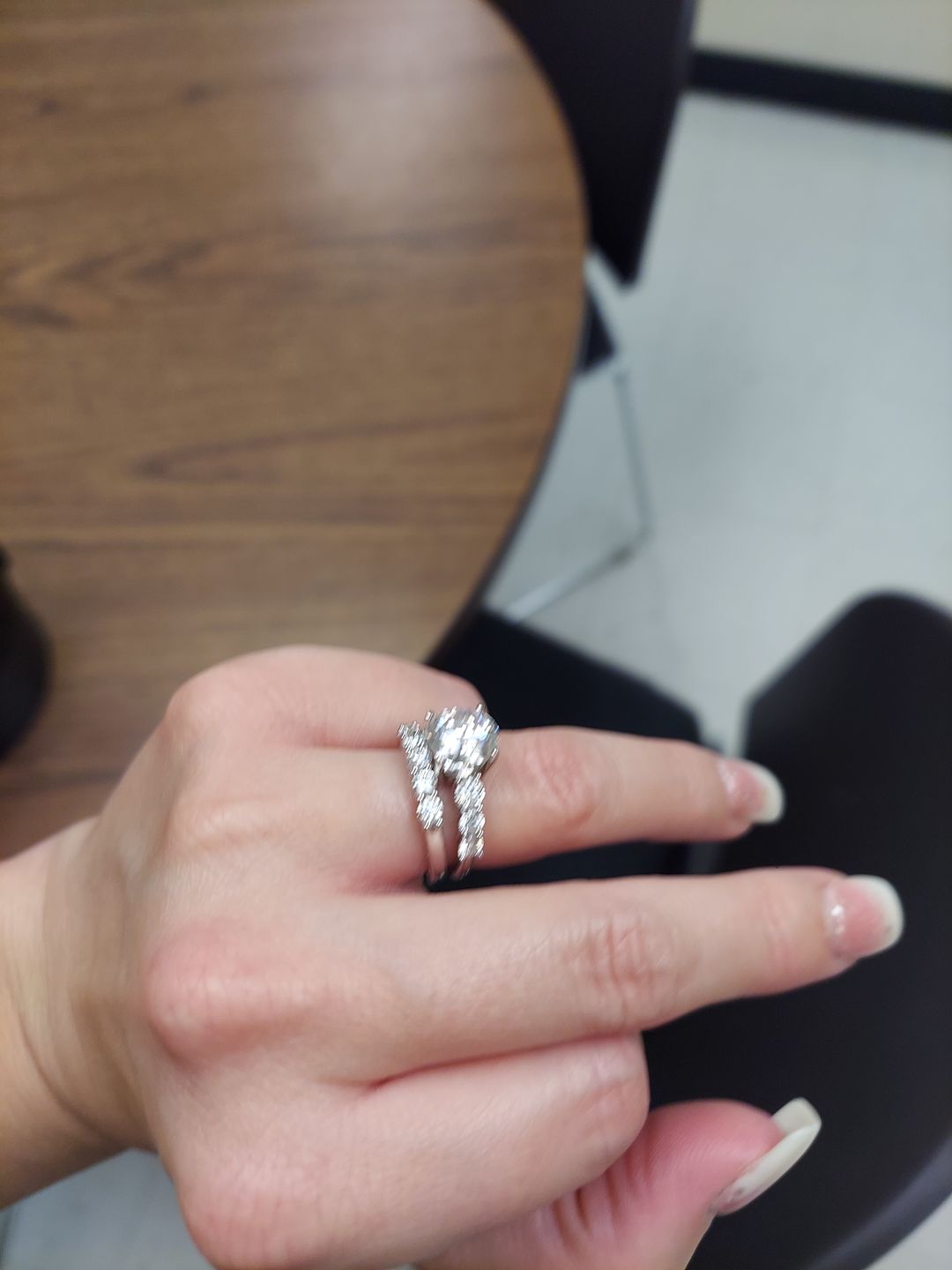 Customer photo review of Round Moissanite Sterling Silver Wedding Band Stackable Ring