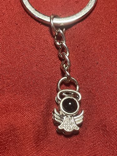 Customer photo review of Guardian Angel Keychain Personalized Photo Projection Keychain