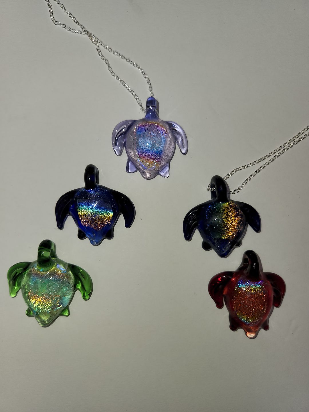Customer photo review of Dichroic Turtle Pendant with Infused Cremation Ashes