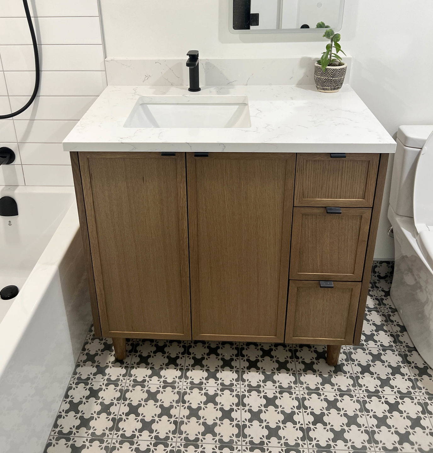 Customer photo review of Cape Breton 36" Mid Century Oak Bathroom Vanity, Left Sink