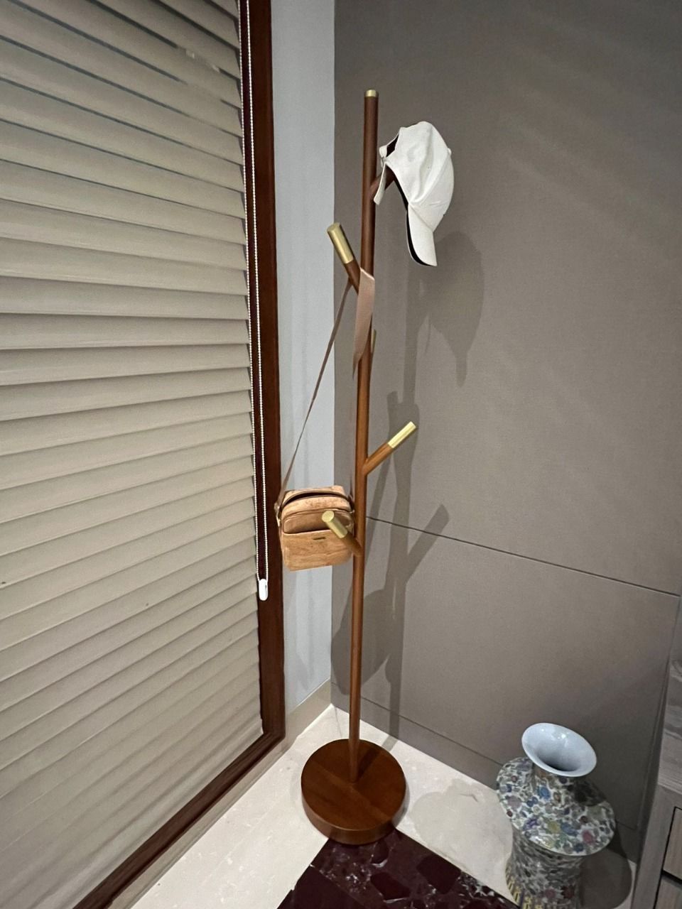 Customer photo review of Minimalist Teak Coat Rack – Branch Design