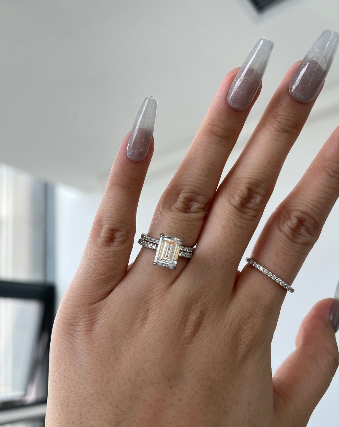 Customer photo review of Louily Classic Emerald Cut Engagement Ring In Sterling Silver