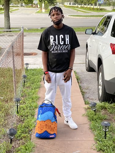 Customer photo review of Mystery Box of 12 T-Shirts