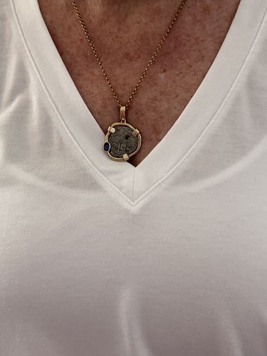 Customer photo review of Atocha 1622 Shipwreck - 2 Reales - Grade 3 - Assayer- Not Visible - Presented in a 14K Gold Mount accented with a Tanzanite gemstone