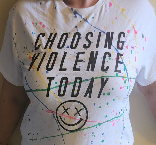 Customer photo review of Salty Savage Unisex “CHOOSING VIOLENCE TODAY” Paint Splatter Tee | Rainbow/White