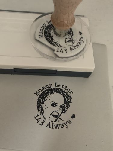 Customer photo review of Wooden Handle Face Stamp