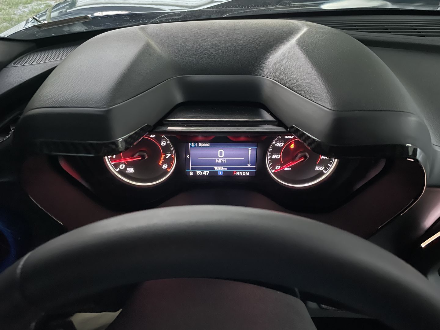 Customer photo review of Carbon Fiber Gauge Bezel Chrome Delete Cover for Chevy Camaro 2016-2022